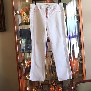Blumarine white jeans with embroidery and laces.